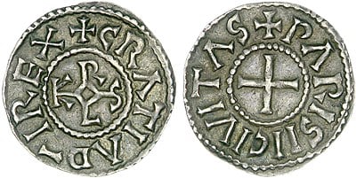 During Charles' reign, what was frequently minted in Paris?