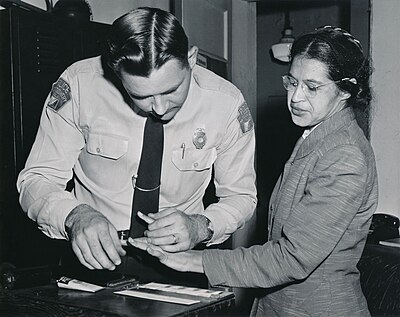 For which U.S. Representative did Rosa Parks work as a secretary and receptionist?