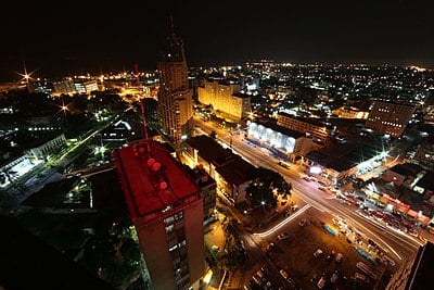 Which city faces Kinshasa across the Congo River?