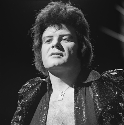 In which year did Gary Glitter's song "Rock and Roll" become one of the top 1,001 songs in music history?