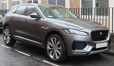 What was the name of the conglomerate that first brought Jaguar and Land Rover together in 1968?