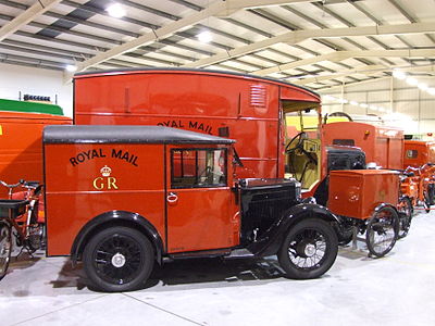 When were the Royal Mail's distinctive red pillar boxes first introduced?