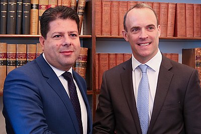 Which position did Raab hold in the second government of David Cameron?