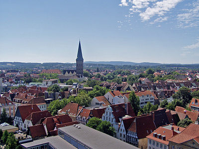What was the population of Osnabrück in 2021, given that it was 164,101 in 2000?