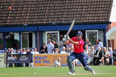 In his debut international match, who was Alastair Cook a replacement for?