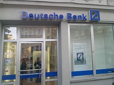 In which year did Deutsche Bank acquire Bankers Trust?