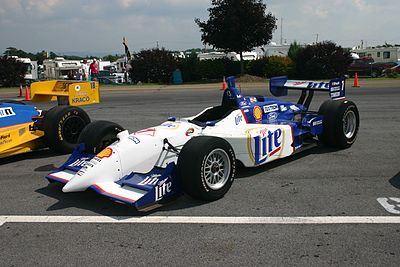 Who was the driver when Rahal Letterman Lanigan Racing won the Indianapolis 500 in 2004?