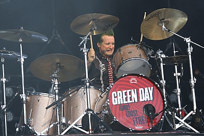 Who is Tré Cool's godfather?