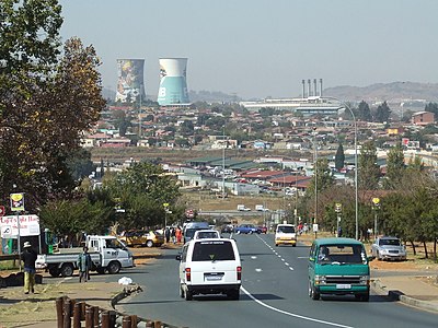 What is the name of the famous street in Soweto where both Nelson Mandela and Desmond Tutu lived?