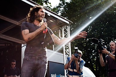 What was Russell Brand's first job in television?