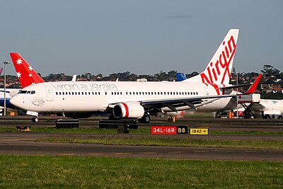 What major event in 2001 helped Virgin Blue become a major airline in Australia's domestic market?