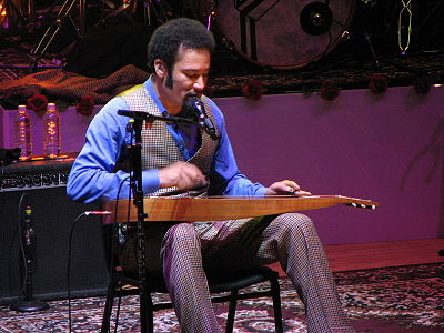Apart from the guitar, what other instrument does Ben Harper play?