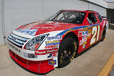 Which team did Ambrose drive for in his final year in NASCAR?