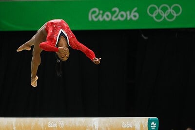 Simone Biles's head coach is or has been Vincent Wevers.[br]Is this true or false?