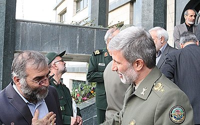 What role did Fakhrizadeh play in the Islamic Revolutionary Guard Corps?