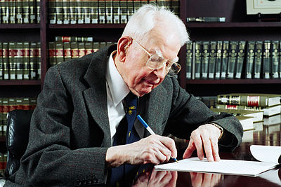In what year did Ronald Coase win the Nobel Prize?