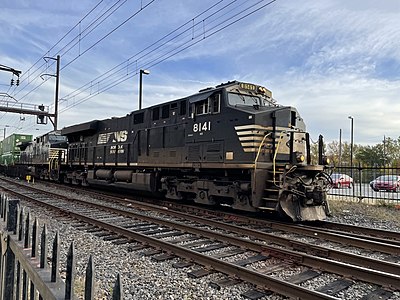 In what ticker symbol does Norfolk Southern Railway trade?