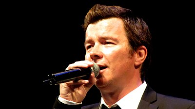 What was the name of the soul band Rick Astley joined as a drummer?