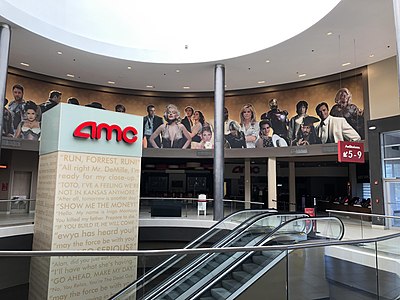 In which year did AMC Theatres become the largest movie theater chain in the world?