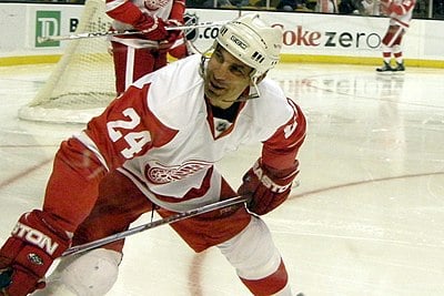 Chris Chelios shares the record for most NHL seasons played with whom?