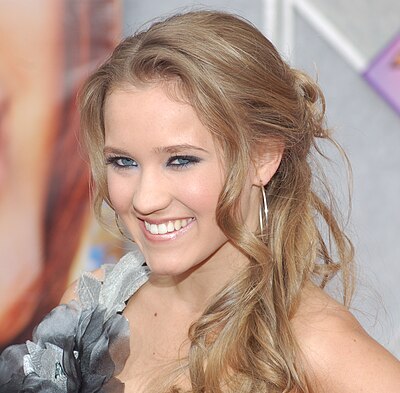 Emily Osment had a recurring role on which CBS sitcom?
