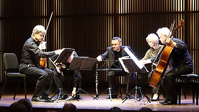 Which ensemble made Widmann their Composer in Residence?