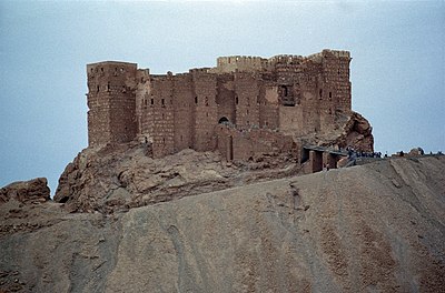 Which empire destroyed Palmyra in 1400, reducing it to a small village?