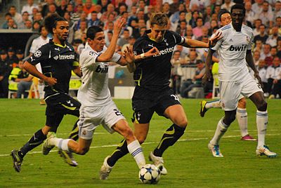 How many domestic quadruples did Di María win with Paris Saint-Germain?
