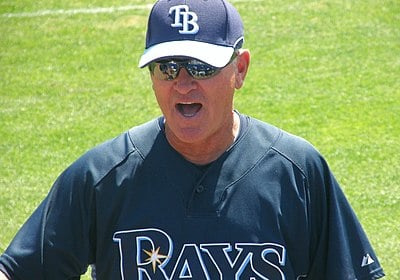In what year did Joe Maddon begin his MLB coaching career with the Angels?