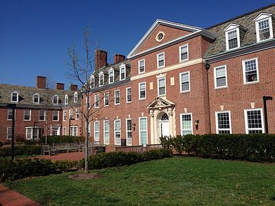 What is the name of the business school at Johns Hopkins University?