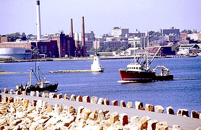 Which group of English settlers founded the original colonial settlement in New Bedford?