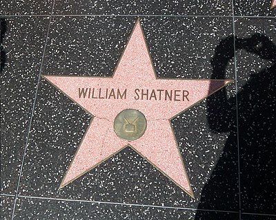 In what year did William Shatner make his debut as Captain James T. Kirk in Star Trek?