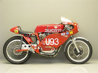 What type of engine is Ducati famous for using in its motorcycles?